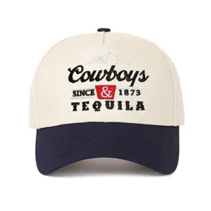High-quality close-up of the Cowboys & Tequila embroidery on a two-tone trucker baseball cap.