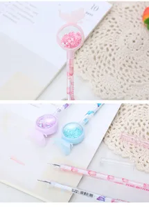 Detail view of cute butterfly gel pen with sparkly heart-shaped sequins inside top