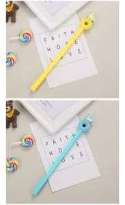 Close-up detail of creative donut and unicorn charms on colorful cartoon gel pens for students