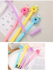 Detailed view of donut and unicorn themed cartoon gel pens in pastel colors