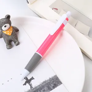 Kreativer rosafarbener Druckkugelschreiber mit weichem grauem Gummigriff für Schüler