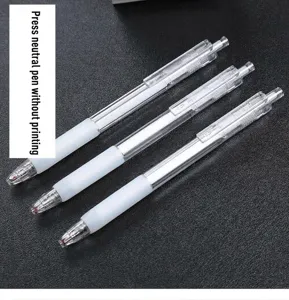 Macro detail of three minimalist retractable gel pens with transparent barrels