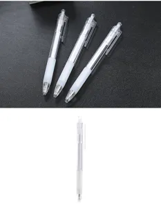 Macro detail of transparent 0.5mm retractable gel pen with minimalist white rubber grip
