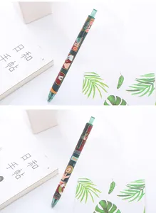 Macro view of cute cartoon animal patterns on the barrel of a retractable gel pen.