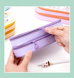Detailed macro view of the smooth double zipper on a large purple canvas pencil case