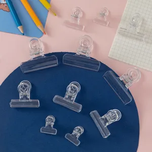 Transparent acrylic binder clips set for office and school paper organization, aesthetic design.