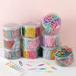 Colorful large paper clips in clear jars office stationery metal bookmarks set detail view