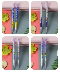 Close-up of purple planet mechanical pencils with cute cartoon astronaut and rabbit designs.