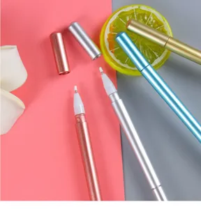 Detailed macro view of colorful metallic electroplated pens featuring massage heads