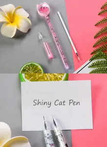 Macro detail of cute pink sequin cat gel pen nibs showing fine writing tips and pen body