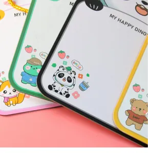 Close-up view of colorful cartoon erasable drawing boards with panda and bear designs.