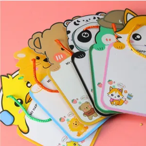 Close-up of cute animal-themed erasable mini whiteboards with colorful hanging ropes