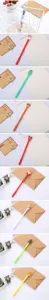 Multiple Christmas-themed gel pens featuring Santa, reindeer and tree designs in festive settings