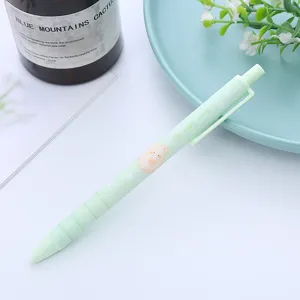 Cute mint green retractable gel pen with cartoon bear illustration for students and office