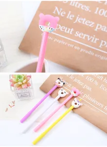 Detailed view of cute cartoon animal donut gel pens on a desktop with a mini succulent