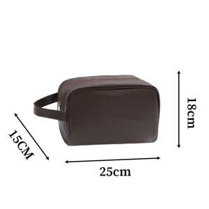 Close-up detail showing dimensions of brown lychee pattern PU leather men's toiletry bag