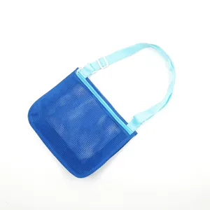 Kids blue mesh beach toy storage shoulder bag close-up detail showing durable strap and zipper.