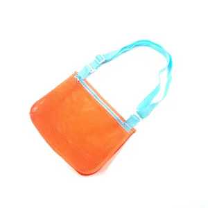 Orange mesh beach bag detail, breathable fabric with adjustable blue strap and zipper.