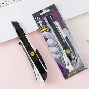 Heavy duty utility knife with 18mm SK5 wide blade, ergonomic black white handle for cutting.