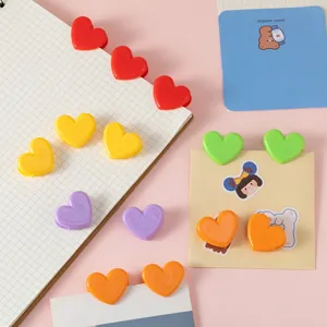 Cute heart-shaped plastic clips in assorted colors, perfect for memo, card holder and DIY floral crafts.