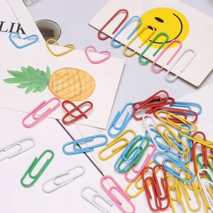 Colorful assorted paper clips in standard and heart shapes, ideal for office and school use.