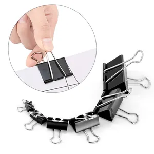 Close-up detail of multi-size metal binder clips with black finish for secure document organization.