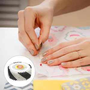 Pearl sewing pins with round storage wheel for DIY dressmaking, craft positioning, and handmade tailoring.