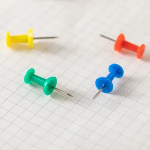 Colorful plastic head push pins with stainless steel points for office and cork board use.