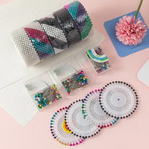 Colorful pearl head pins set, dressmaker pins and round wheel pins for sewing and craft projects.