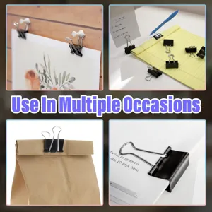Black metal binder clips for office document paper organization and multi-use display.