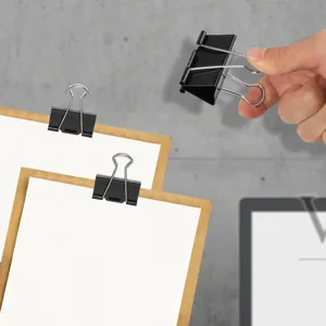 Black metal binder clips for office and school document organization, durable paper clamps.