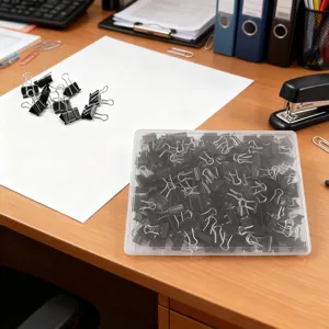 Black metal binder clips set with clear plastic storage box for office paper and document organization