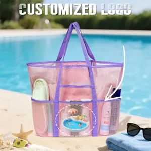Borsa da mare in rete rosa con tasche multiple, ideale per nuoto, viaggi e vacanze estive.
