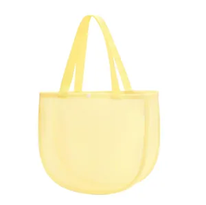 Kids yellow mesh beach bag for sand toys and accessories, breathable storage tote bag.