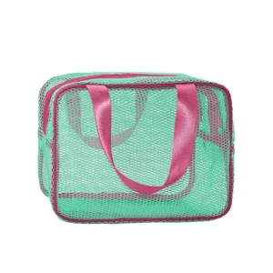 Borsa cosmetica in rete verde con manici rosa, astuccio da viaggio trasparente.