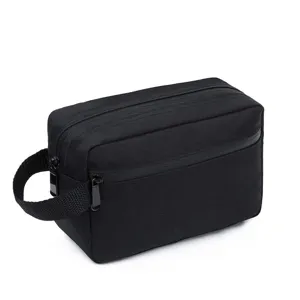 Detail shot of black double-layer toiletry wash bag with side handle and waterproof zipper.