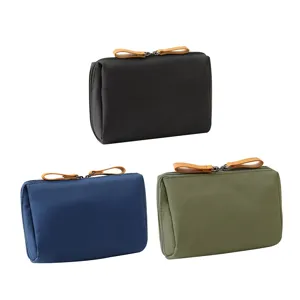 Minimalist portable cosmetic bag multi-color travel pouch mini makeup storage organizer.