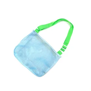 Close-up detail of blue mesh beach bag with green strap, breathable hollow design.