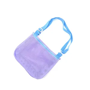 Purple mesh beach bag detail, breathable see-through material with blue adjustable shoulder strap.