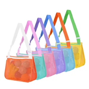 Colorful mesh beach bag for kids, breathable toy storage shoulder bag with adjustable strap.