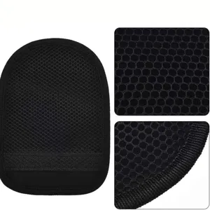Black mesh bath mitt and sand removal towel detail view, breathable honeycomb texture fabric.