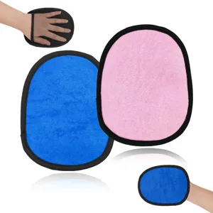 Close-up detail showing the soft dual-color sand removal mitt texture and comfortable hand strap.