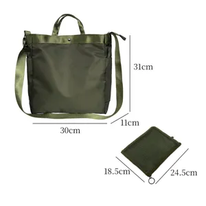 Gruene Nylon-Tragetasche mit Schultergurt und Netztasche, große Kapazität Reise-Aufbewahrung.