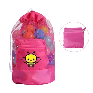 Sac de plage filet rose rangement jouet avec cordon de serrage et poche abeille pliable.