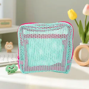 Cyan mesh cosmetic bag see-through travel pouch hollow storage organizer for daily use.