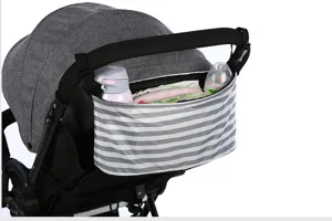 Stroller organizer bag with grey stripes, hanging on prams to hold baby bottles and wipes.
