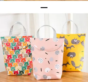 Waterproof baby diaper storage hanging bag with cute cartoon patterns, stroller organizer bag.