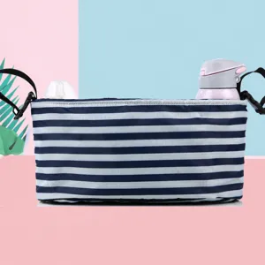 Stroller organizer bag with large capacity, striped pram storage bag for baby carriage.