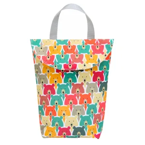 Waterproof cartoon bear diaper bag and stroller hanging storage pouch for baby essentials.