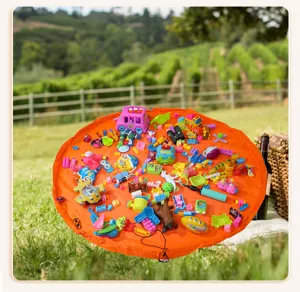 Portable toy storage bag and play mat with drawstring, ideal for organizing children toys.